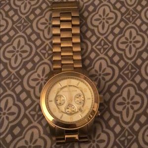 Mk oversized face gold watch